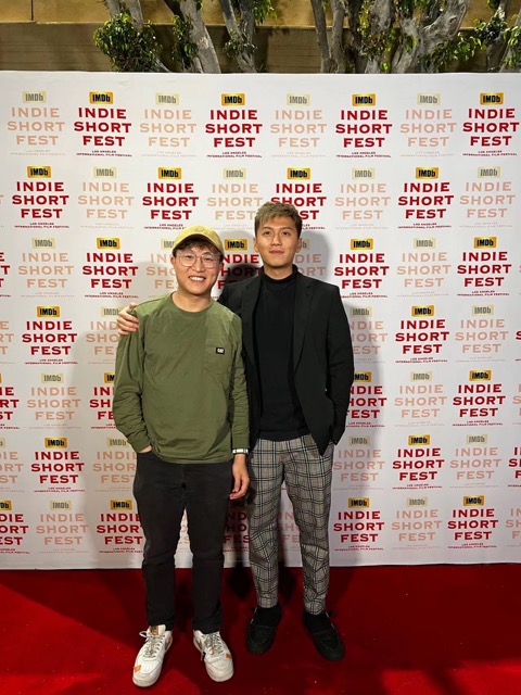 Wei Li (on left) with director Kenneth Ma